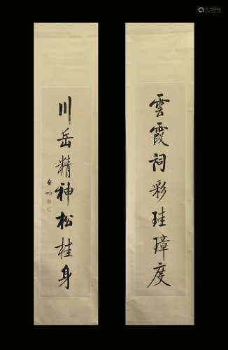 A PAIR OF VINTAGE CHINESE CALLIGRAPHY COUPLETS