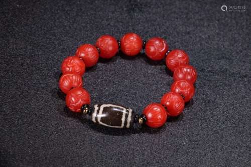A Chinese Red Agate Bracelet With Dzi