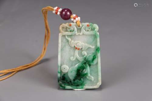 A Chinese Jadeite Pendant With Beast Carving