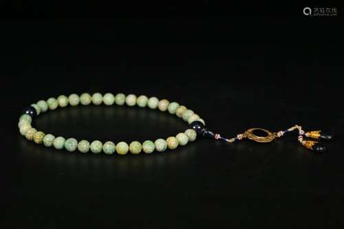 A Chinese Jadeite Necklace With Sapphire