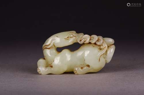 A Chinese Hetian Jade Beast-Shaped Pendant