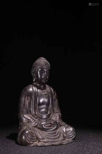 A Chinese Rosewood Buddha