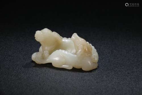 A Chinese Hetian Jade Dog-Shaped Ornament