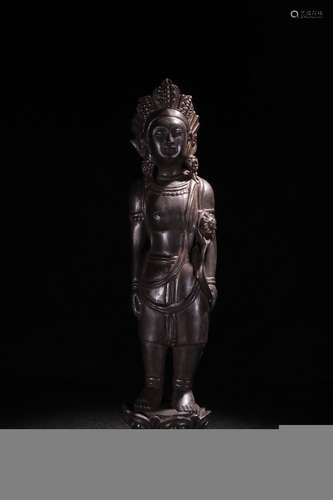 A Chinese Rosewood Guanyin Shaped Ornament