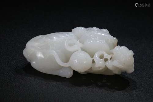 A Chinese Hetian Jade Lion-Shaped Ornament