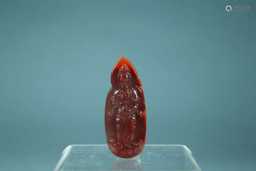 A Chinese Red Agate Pendant Of Buddha Carving