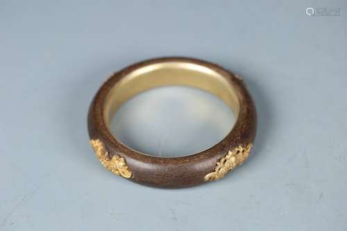 A Chinese Agarwood Bangle With Gilt Silver