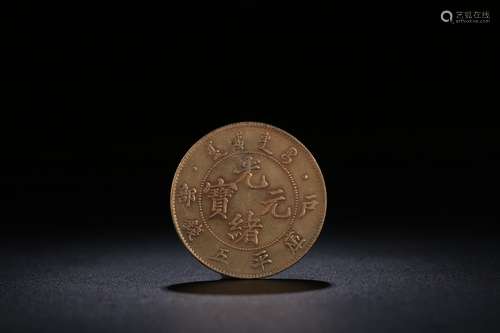 A Chinese Gilt Silver Coin