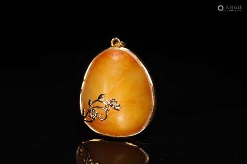 A Chinese Hetian Jade Pendant With Gold