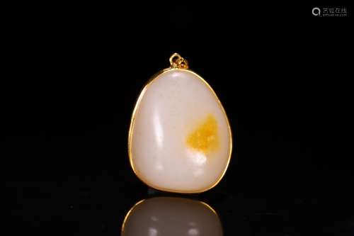 A Chinese Hetian Jade Pendant With Gold