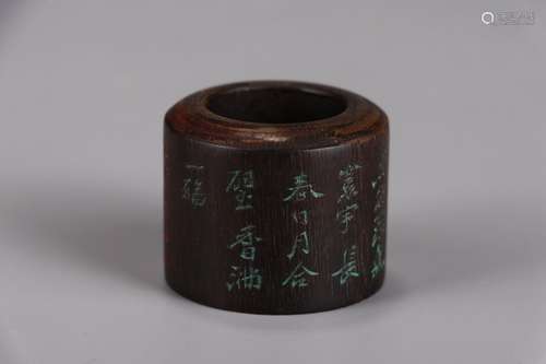 A Chinese Agarwood Thumb Ring With Poetry Carving