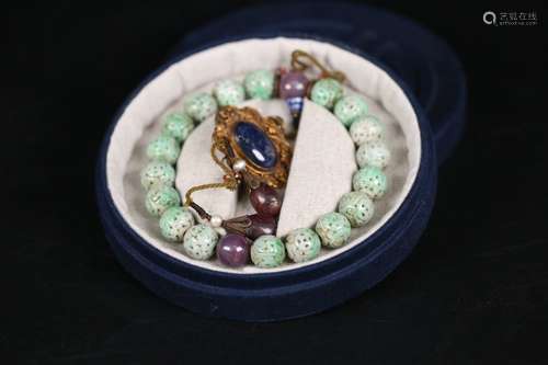 A Chinese Jadeite Bracelet With Sapphire And Rumark