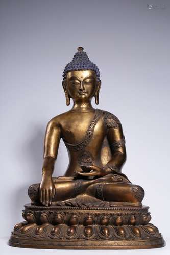 A Chinese Gilt Bronze Sitting Buddha