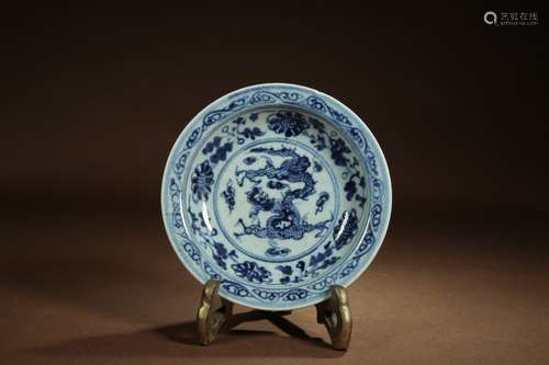 A Chinese Blue And White Bowl With Dragon Patterns