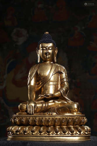 GILT BRONZE CAST AND ORNATE 'SHAKYAMUNI' SEATED FIGURE