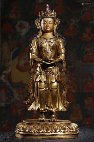 GILT BRONZE CAST AND ORNATE 'SHAKYAMUNI' STANDING FIGURE