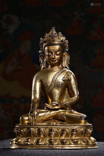 GILT BRONZE CAST AND ORNATE 'SHAKYAMUNI' SEATED FIGURE