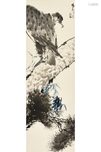 INK AND COLOR ON PAPER, VERTICAL SCROLL. THE PAINTING DEPICTS AN EAGLE PERCHED ON PINE TREE, LOOKING DOWNWARDS AND READY TO PREY, ARTIST SIGNATURE AND MARK ON RIGHT SIDE.