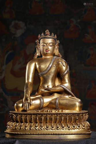 GILT BRONZE CAST AND SILVER INLAID 'SHAKYAMUNI' SEATED FIGURE