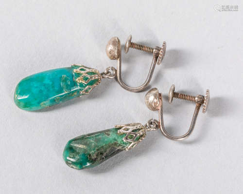 A Pair Of Turquoise Tear Drop Earrings