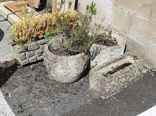 Four assorted cast garden planters of various forms (4)