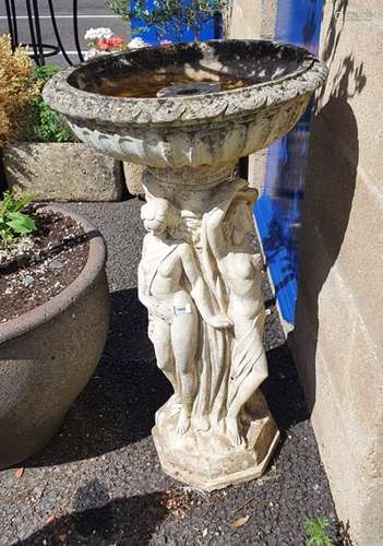 Cast bird bath of classical form, on a support of three maidens and a resin cast statue of female