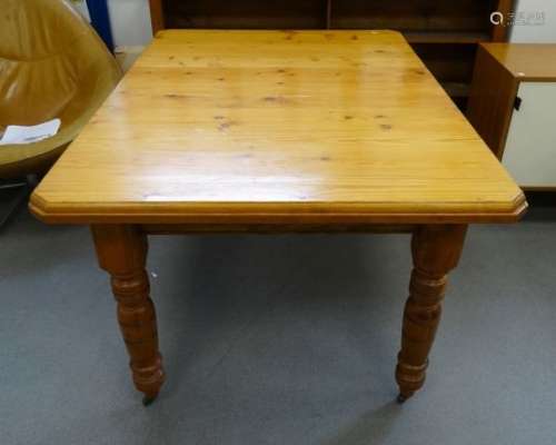 Late 19th century pine extending dining table, rectangular top with moulded edge and canted
