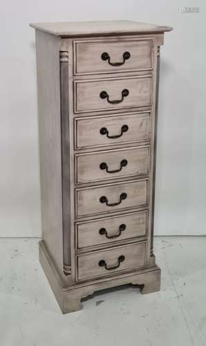 20th century narrow painted chest of seven drawers with fluted column pilasters raised on bracket