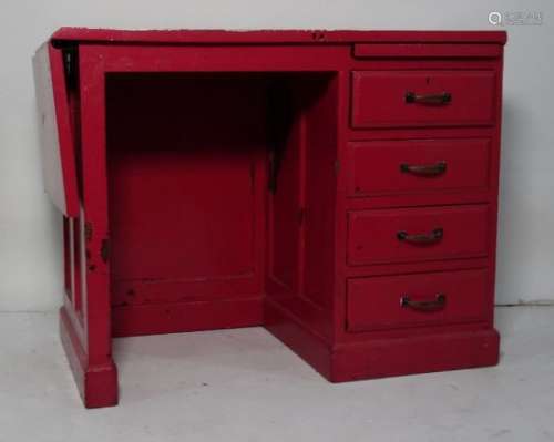 Pink painted desk with drop leaf and pull-out writing slide, four drawers, plinth base