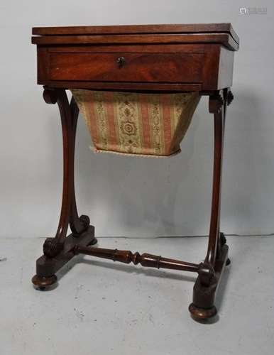 Victorian rosewood games work table, the rectangular top above plain edge, opening to reveal