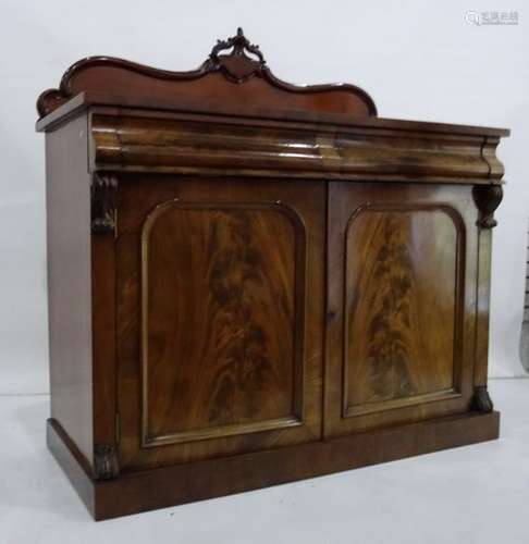 19th century mahogany sideboard with shaped and moulded back above the rectangular top, two