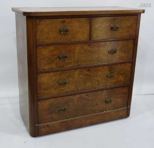 19th century chest of drawers, rectangular top with rounded front corners, the drawer fronts in