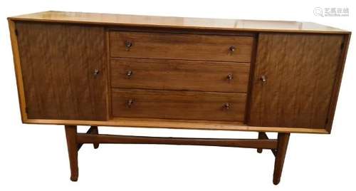 Gordon Russell Afromosia teak sideboard, three central drawers, flanked by cupboard doorsCondition