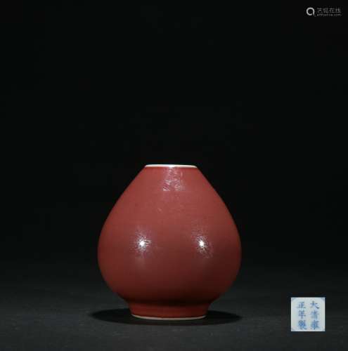 Qing dynasty cowpea red glaze bottle