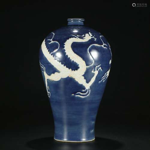 Qing dynasty blue glaze bottle with dragon pattern