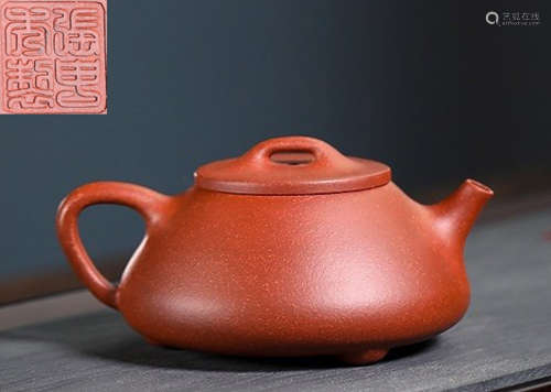 A FIGURE PATTERN ZISHA POT MADE BY ZHANGSHENXIU