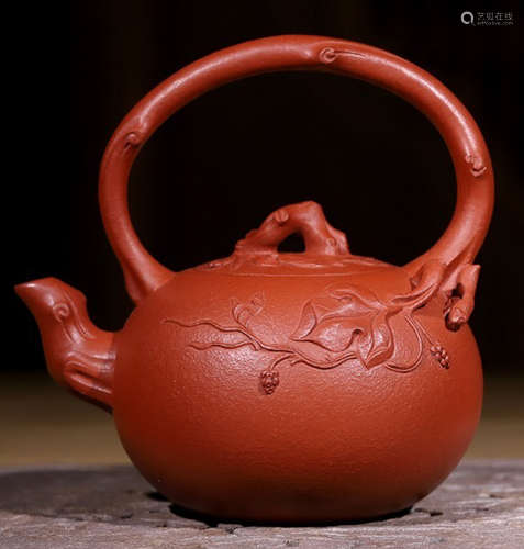 A FLOWER PATTERN LIFTING ZISHA POT MADE BY ZHANGQUN