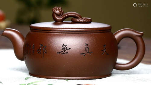 A FIGURE PATTERN ZISHA POT MADE BY ZHUANGQIFANG