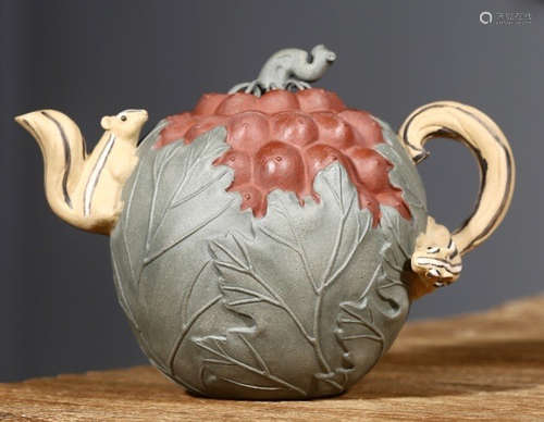 A GRAPE PATTERN ZISHA POT MADE BY ZHANGJIAN