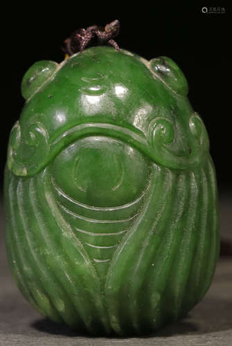 A HETIAN JASPER CARVED CICADA SHAPE PENDANT