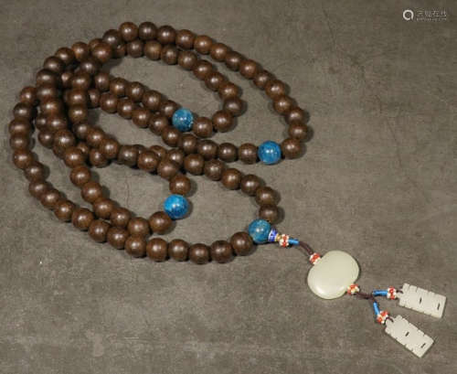 A ZITAN WOOD NECKLACE WITH JADE