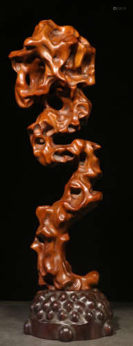 A HUANGYANG WOOD CARVED ORNAMENT
