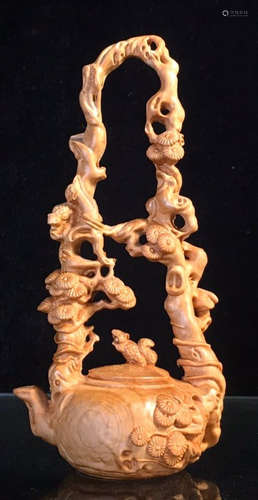 A YABAI WOOD CARVED LIFTING POT