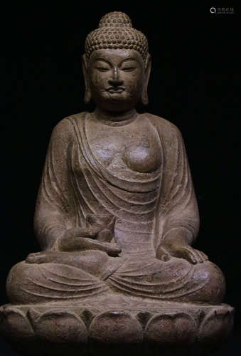 A BLUE STONE CARVED BUDDHA STATUE