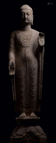 A BLUE STONE CARVED BUDDHA STATUE