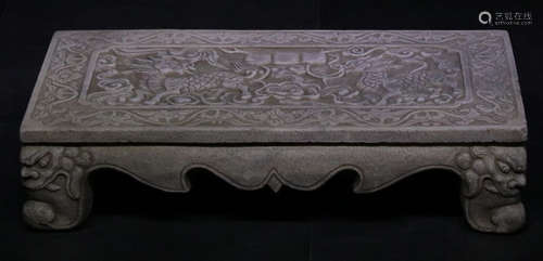 A WHITE MARBLE CARVED BEAST PATTERN DESK