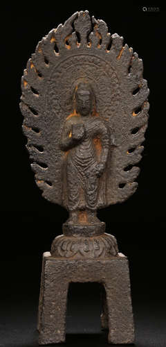 AN IRON CAST SAKYAMUNI BUDDHA STATUE