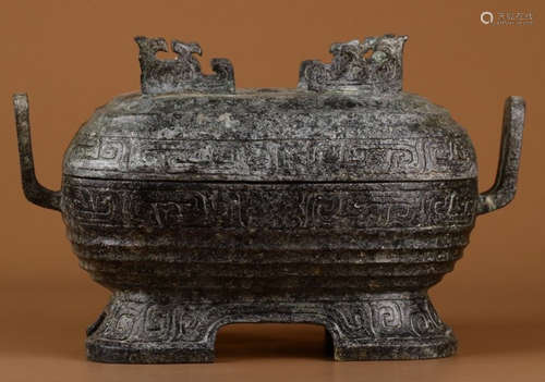 A BRONZE CASTED CONTAINER