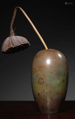 A COPPER CAST OLIVE SHAPE VASE