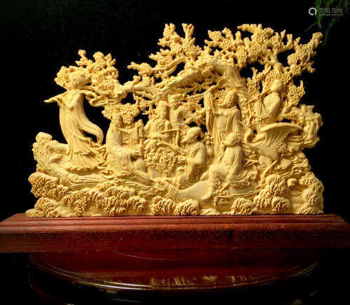 A HUANGYANG WOOD CARVED BUDDHA PATTERN ORNAMENT